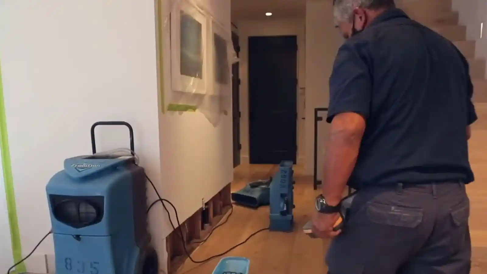 Water damage extraction and drying equipment in use at a Tarpon Springs property